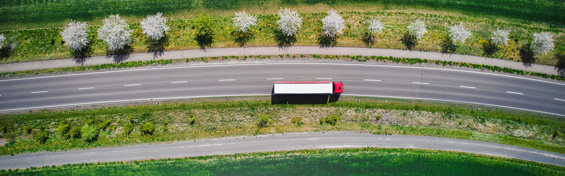 Truck-Sustainable-Resources-Semi-Truck-Delivering-Road-1920